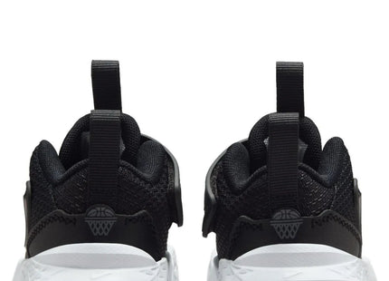 Zapatilla Nike Team Hustle D 12 Niño Negro Blanco Velcro